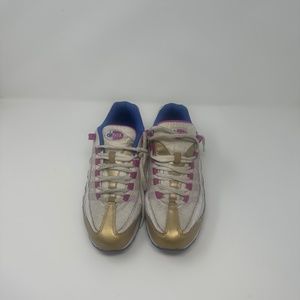 Nike pink purple white and gold